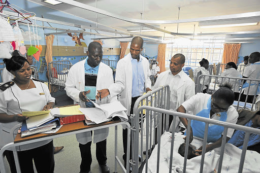 A neurosurgeon does his rounds with Medunsa students in one of the wards at Dr George Mukhari Hospital in Garankuwa. File photo