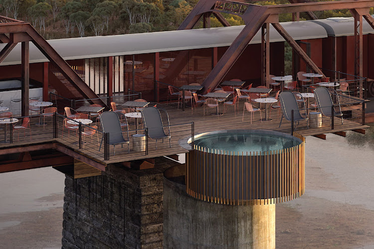 The viewing deck and pool jut out from the centre-lounge carriage.