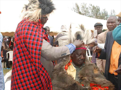 Cord leader Raila Odinga being crowned as an Elder at Meibeki near Eldoret yesterday