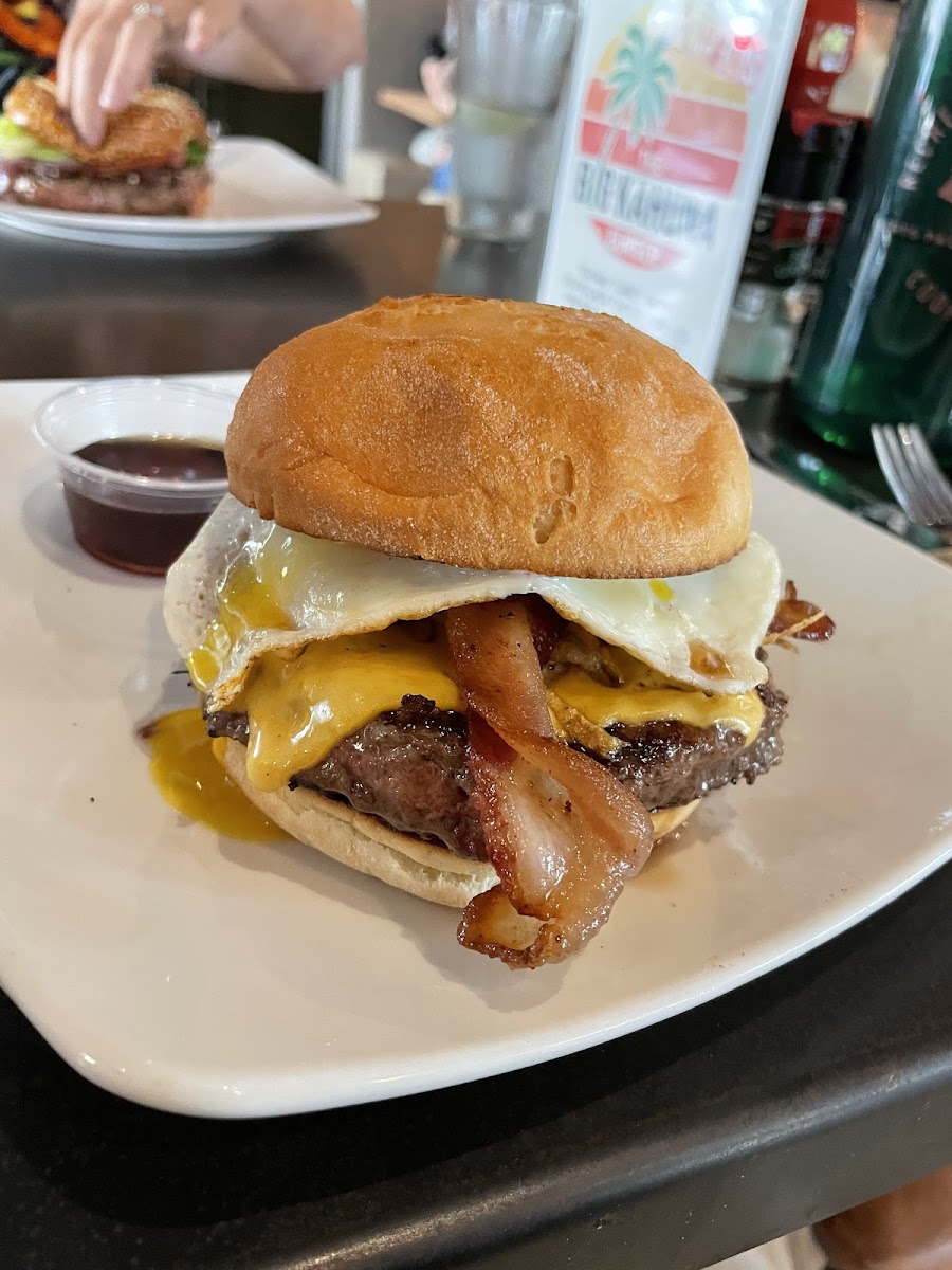 Breakfast burger! Comes with hash browns, bacon, sunny side up egg, and a side of maple syrup. Delicious!
