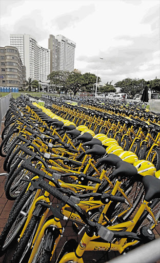 Bicycles for rent await customers on the Durban beachfront. They are being provided as a way of reducing carbon emissions Picture: TEBOGO LETSIE
