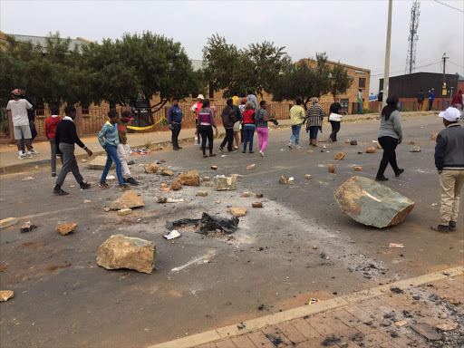 Residents of Freedom Park protesting for proper allocation of houses Pictures: Neo Goba