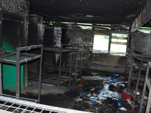 CALLING Well-wishers: Nakuru Boys High School dormitory, which was partly de- stroyed by fire on Wednesday night. Blankets, mattresses and cash are needed.