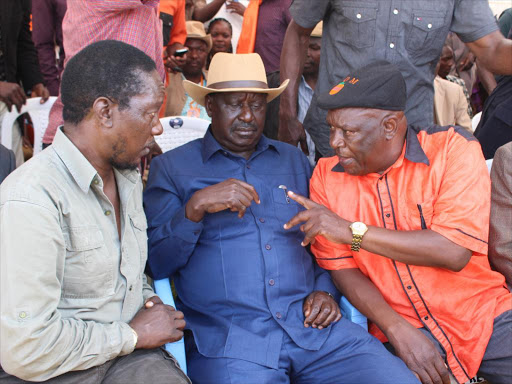 Kitutu Masaba MP Timothy Bosire, Cord leader Raila Odinga and Governor John Nyagarama at county assembly grounds on June 13 /AGWENYI GICHANA