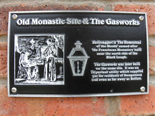 The following text is included, "Ballysaggart is the 'Homestead of the Monks' named after the Franciscan Monastery built near the north side of Black Lough. The Gasworks was later built on the...