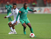 Gift Motupa of Baroka FC gets past James Okwuosa of Chippa United during the Absa Premiership match between Chippa United and Baroka FC at Nelson Mandela Bay Stadium on September 12, 2017 in Port Elizabeth.