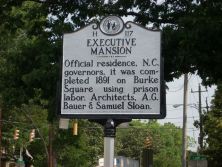 Official residence, N.C. governors, it was completed 1891 on Burke Square using prison labor. Architects, A.G. Bauer & Samuel Sloan.Plaque via North Carolina Highway Historical Marker Program, and...