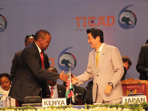 President Uhuru Kenyatta with Japan Premier Shinzo Abe after the closing ceremony of TICAD 6 in Nairobi on August 28. PHOTO/ENOS TECHE