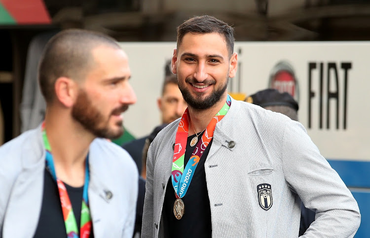 Italy's Gianluigi Donnarumma and Leonardo Bonucci ahead of meeting Italy's Prime Minister Mario Draghi.