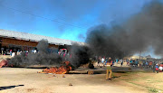 Businesses closed shop in Delareyville after residents took to the streets to revive their call for the removal of North West premier. 