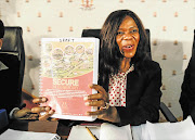 ALPHABET SOUP: Public protector Thuli Madonsela with the Nkandla report in Pretoria