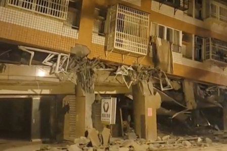 A building, which according to the Hualien government is unoccupied after it was previously damaged in an earlier quake on April 3, is seen following a series of earthquakes, in Hualien, Taiwan, on April 23 2024 in this still image obtained from social media video.
