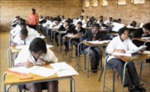 TESTING: Matrics get down to work on the first day of the final exams. Pic. Lucky Nxumalo. 10/10/07. © Sowetan.