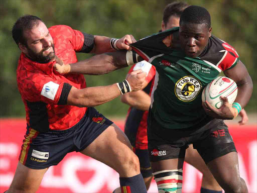 Fernando Lopez of Spain’s Los Leones tackles Joshua Chisanga of Kenya’s Simbas during a past test match. /PIC-CENTRE