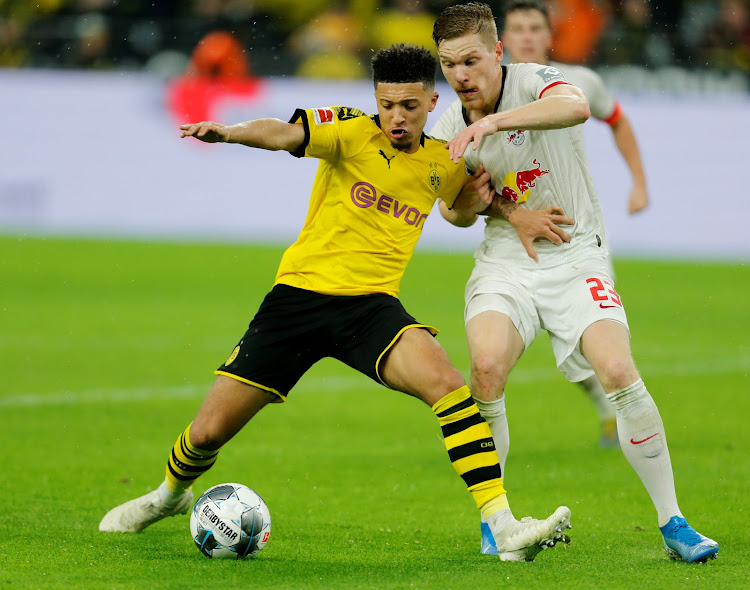 Borussia Dortmund's Jadon Sancho in a past action with RB Leipzig's Marcel Halstenberg