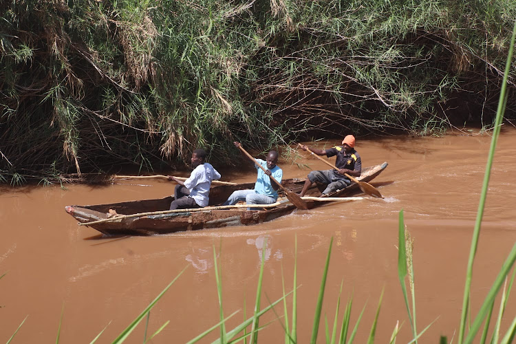 Local divers in River Kuja look for the body of a boy grabbed by crocodile in Ndhiwa on February 1, 2024