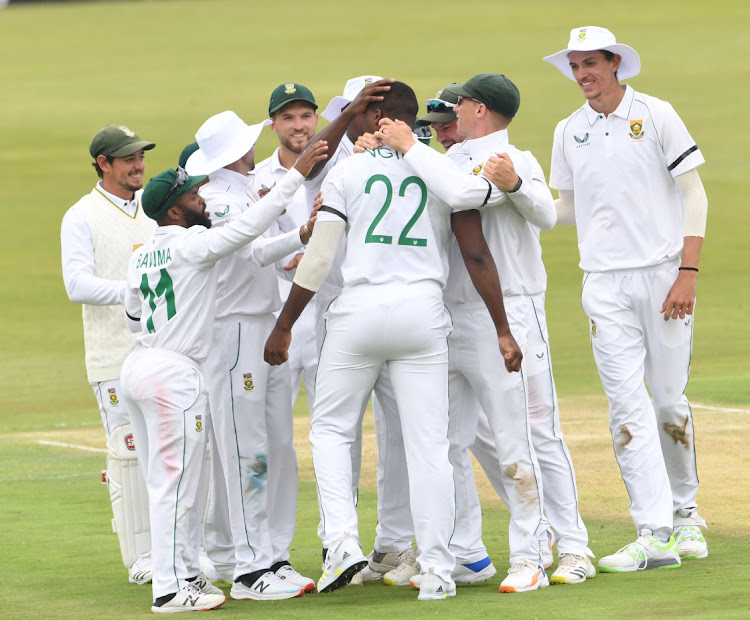 Proteas players celebrate the wicket of India's Mayank Agarwal during day one of the Boxing Day Test at SuperSport Park on Sunday.