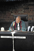 Constitutional Court Judge President Mogoeng Mogoeng listens to arguments in the dispute between Cape Judge President John Hlophe and the court.