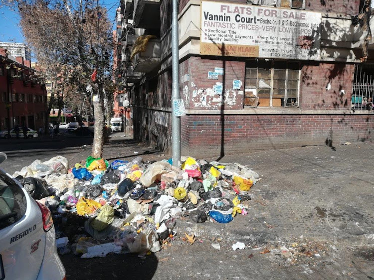 Rubbish piled up outside Vannin Court in Hillbrow where a joint law enforcement team conducted a raid on Wednesday June 12 2019 in an operation to rid the area of criminals.