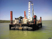 TOOL OF TRADE: An Esorfranki barge at the first marine borehole position at Pemba. South African companies look set to lose millions after the Mozambican government 'withdrew' a port construction project