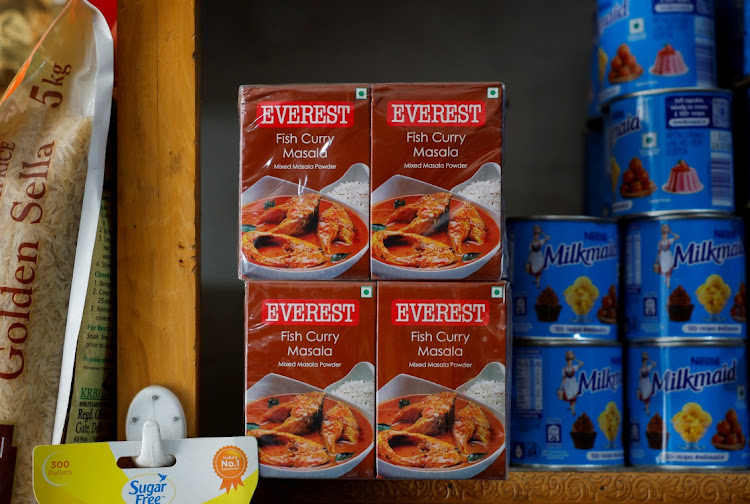 Boxes of Everest fish curry masala are stacked on the shelf of a shop at a market in Srinagar, on April 23, 2024. Picture: REUTERS/SHARAFAT ALI