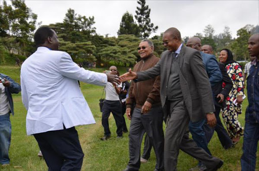 Cord leader Raila Odinga is received by Taita Taveta Governor John Mruttu at the start of a two-day tour of the county, August 14, 2015. /COURTESY