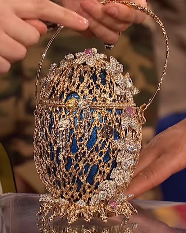 Designer Debbie Wingham shows off her eggstravagant creation on The Wendy Williams Show.