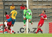 Ronwen Williams, centre, of SuperSport United, announced his return from injury with fine saves against Downs. 