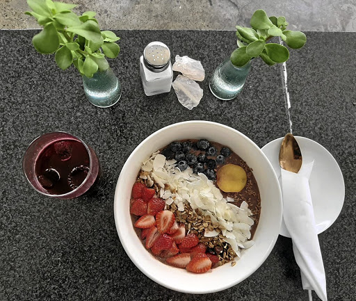 A smoothie bowl with beet juice.
