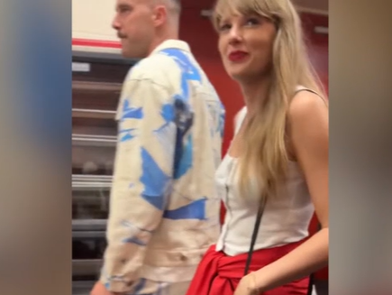 Taylor Swift was captured strolling down a corridor with her rumoured new love interest.