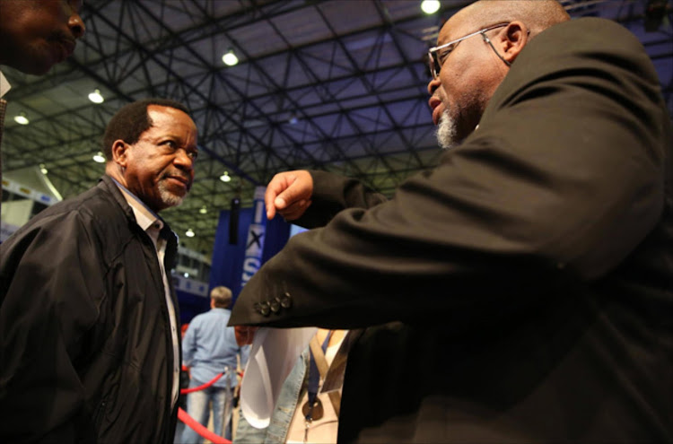 ACDP leader Kenneth Meshoe chats with the ANC's Gwede Mantashe chats with at IEC's results centre in Pretoria.