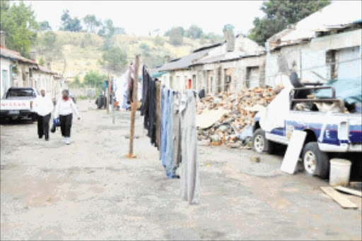 NOT SAFE: Residents of Durban Deep in Roodepoort say it is a den of criminals. Pic. Vathiswa Ruselo. 24/03/2010. © Sowetan.
