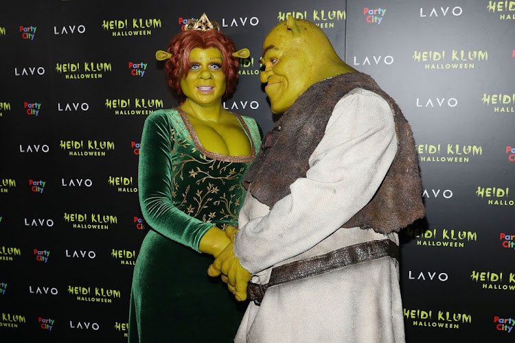 Know as the Queen of Halloween, Heidi Klum did not disappoint with this year's look: Princess Fiona from 'Shrek'. Her boyfriend Tom Kaulitz donned a matching ogre suit.