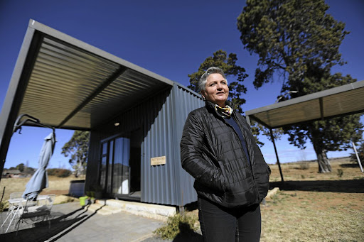 Debbie Agenbag outside a tiny home she constructed in Rosendal in the Free State. The tiny home movement is gaining popularity in SA.