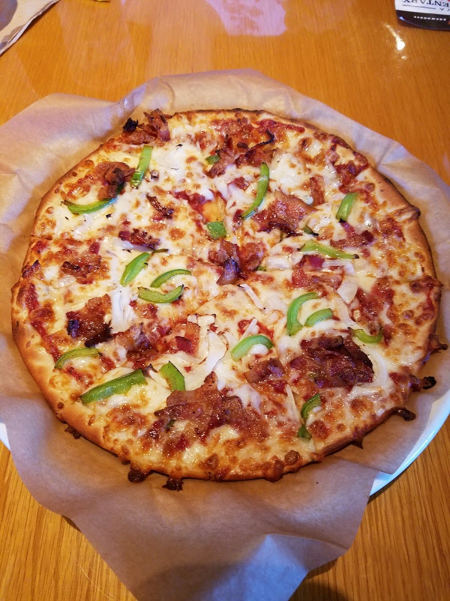 Gluten free applewood smoked bacon, green pepper and onion pizza