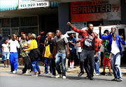 Community members attacking Nigerian nationls in Church street Pretoria accusing them of selling drugs and also trafficking girls.