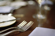 Close-up of a fork on a dining table Photo Credit: Thinkstock