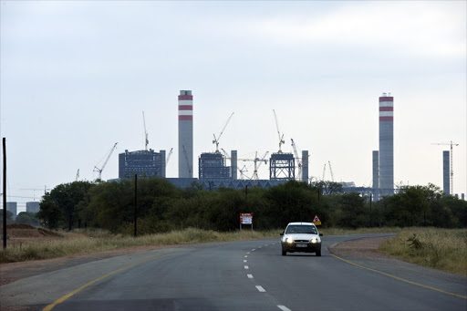 The rate at which South African consumers and businesses adopt alternative power sources such as the Powerwall battery will determine whether more coal-fired power stations like Medupi, pictured here, ought to be built.