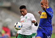 Mhlengi Cele of AmaZulu controls ahead of Robyn Johannes of Cape Town City during the Absa Premiership 2017/18 game between Cape Town City and AmaZulu at Cape Town Stadium on 15 December 2017.