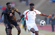 Siphelele Mthembu, then in the colours of Free State Stars, is being challenged by Eric Mathoho of Kaizer Chiefs during the Maize Cup final match at the James Motlatsi Stadium, Orkney on July 14 2018.