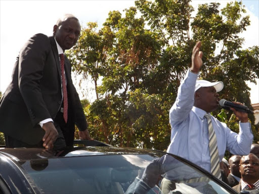 Deputy President William Ruto and Kiambu Governor William Kabogo at Ngoingwa estate in Thika. Photo/JOHN KAMAU