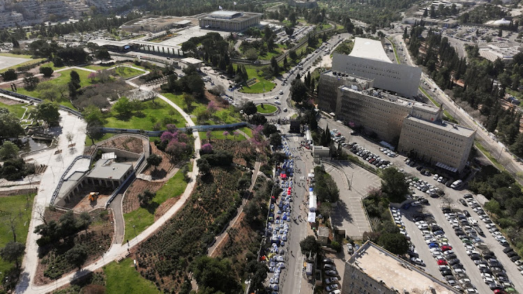 A drone view shows Israeli protesters demanding Israel’s Prime Minister Benjamin Netanyahu’s ouster, after the October 7 attack on Israel by the Palestinian Islamist group Hamas and the ensuing war in Gaza, in front of the Knesset (Israeli parliament), in Jerusalem, on April 1, 2024. Picture: REUTERS/ILAN ROSENBERG