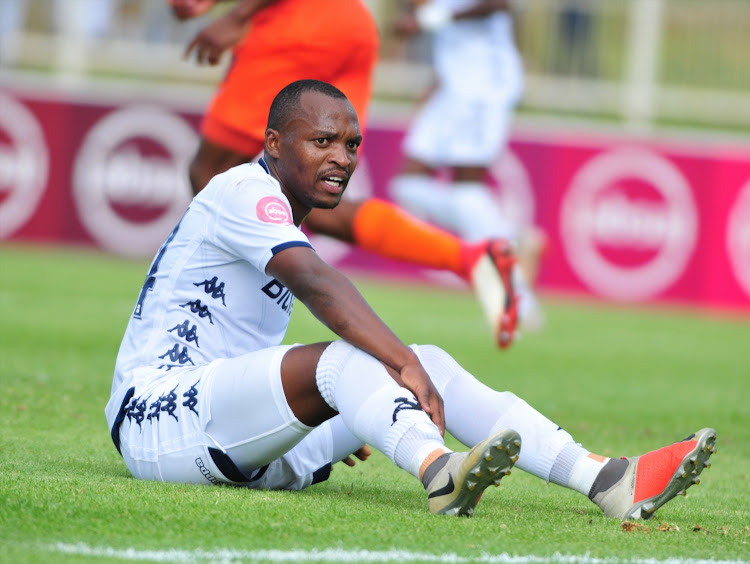 Bidvest Wits striker Gift Motupa stays down on the floor waiting for medical attention during an Absa Premiership match against Polokwane City at Old Peter Mokaba Stadium on January 20 2019.