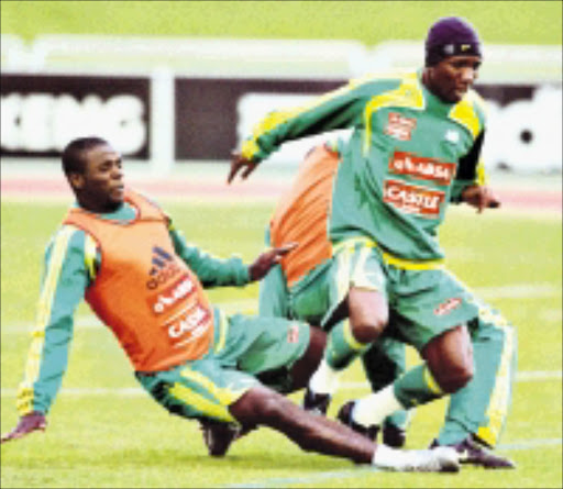 20080526VNH Aaron Mokoena and Teko Modise during the Bafana Bafana training at Germiston Stadium.PIC :VELI NHLAPO. © SOWETAN