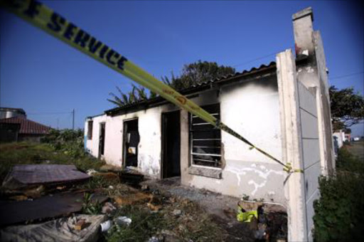 The house which a woman burnt and died in West Bank picture: MARK ANDREWS