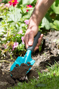 Ditch your shovels for hand trowels that offer perfect precision.