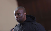 Elvis Ramosebudi, a man who allegedly plotted to assassinate officials perceived as state capture beneficiaries made his first appearance in the Johannesburg Magistrate’s Court today. PHOTOGRAPH : ALON SKUY/ THE TIMES