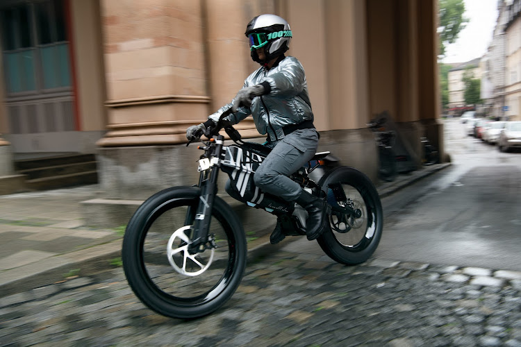 The pedal-less BMW Motorrad Vision AMBY weighs just 65kg, significantly lighter than regular motorbikes. Picture: SUPPLIED