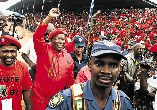 Julius Malema greets his supporters at a mini-rally in Rolle in the Bushbuckridge area of Mpumalanga. File photo.