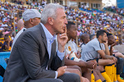 Ernst Middendorp and his bench watch from the sidelines during the Macufe Cup match against Bloemfontein Celtic.   